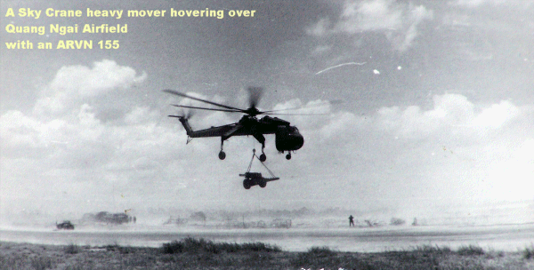 Dennis Currie photo: SZky Crane hovering at Quang Ngai Airfield with an ARVN 155 howitzer, 1967