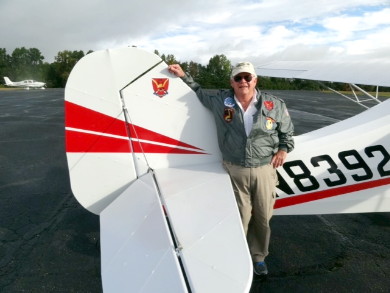 Doc Clement and his aircraft, N8392