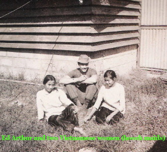 Ed Arthur and two Vietnamese women (hooch maids)