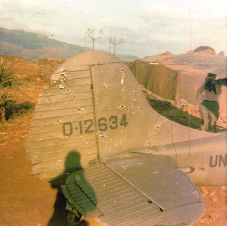 Catkiller Birddog damaged by 23 mm at Khe Sanh, 1971, photo by Tom Murray, Sundowner Mike