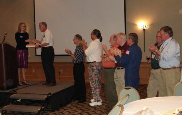 Carl Drechsel receiving letter and flag from rep