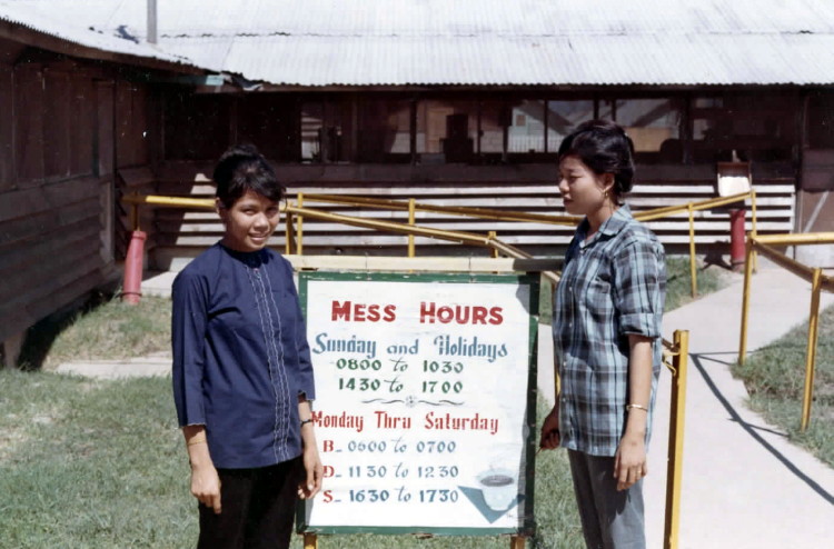 Catkiller Mess Hall and two Vietnamese employees