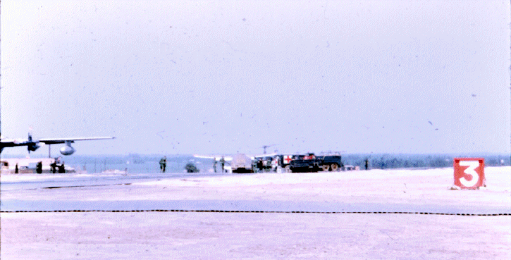 Bill Hooper landing to receive medical attention after being severely wounded inflight. Photo courtesy Jim Lawrence