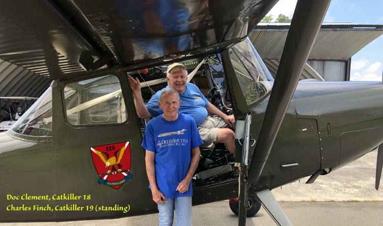 Doc Clement sitting in his Birddog 2, with Charles Finch