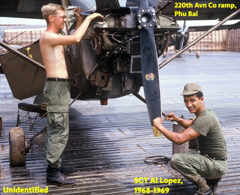 Some of the much-appreciated men who kept them running! Kneeling working on the prop is Al Lopez and man standing is unidentified. Photo by Charles Finch