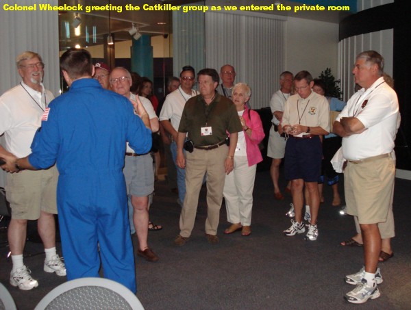 Colonel Doug Wheelock greeting Catkiller group